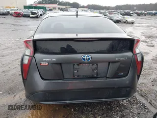 2017 Toyota Prius Two z VIN JTDKARFU9H3046747, wystawiony jako IAAI lot #41773391 z przebiegiem 148 728 mil mil oraz . Historia ofert i sprzedaży dostępna na DreamBid. Obrazek 16.