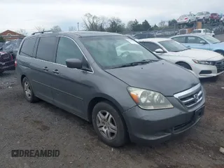 2007 Honda Odyssey EX-L with VIN 5FNRL38777B074397, listed as a IAAI auction lot 41965461 with 210,696 mi miles. Bid and sale history available at carsss.com. Image 1.