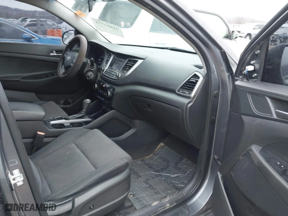 2017 Hyundai Tucson Value with VIN KM8J33A22HU358357, listed as a IAAI auction lot 41583774 with 139,338 mi miles. Bid and sale history available at carsss.com. Image 5.