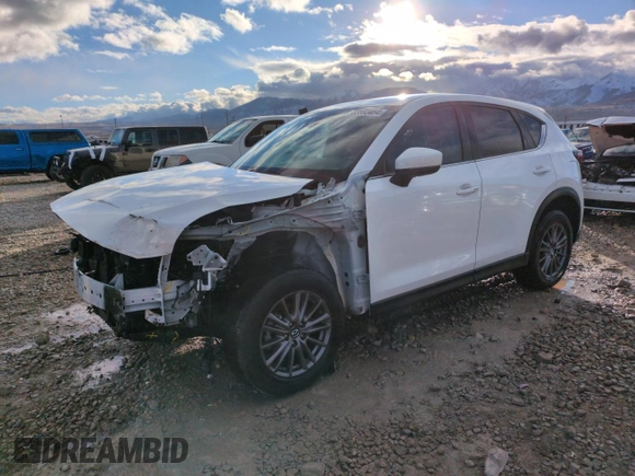 2021 Mazda CX-5 Touring with VIN JM3KFBCM0M0355894, listed as a Copart auction lot 83593464 with 80,703 mi miles and Salvage Title. Bid and sale history available at carsss.com. Image 1.