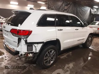 2022 Jeep Grand Cherokee Limited with VIN 1C4RJFBG7NC165888, listed as a IAAI auction lot 41436251 with 58,320 mi miles and . Bid and sale history available at DreamBid. Image 4.