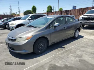 2012 Honda Civic LX z VIN 2HGFB2F57CH314071, wystawiony jako Copart lot #57987355 z przebiegiem 211 678 mil mil oraz Szkoda całkowita • Salvage title. Historia ofert i sprzedaży dostępna na DreamBid. Obrazek 1.