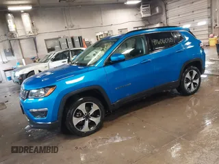 2020 Jeep Compass Latitude with VIN 3C4NJDBBXLT104849, listed as a IAAI auction lot 41606035 with 116,706 mi miles. Bid and sale history available at carsss.com. Image 2.