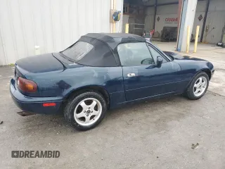1996 Mazda MX-5 Miata z VIN JM1NA3531T0718068, wystawiony jako Copart lot #56614065 z przebiegiem 116 486 mil mil oraz Szkody całkowita. Historia ofert i sprzedaży dostępna na DreamBid. Obrazek 3.
