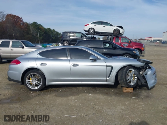 2015 Porsche Panamera 4S z VIN WP0AB2A70FL050779, wystawiony jako IAAI lot #40977292 z przebiegiem 78 574 mil mil oraz . Historia ofert i sprzedaży dostępna na DreamBid. Obrazek 13.
