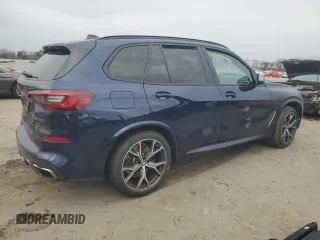 2022 BMW X5 M50i with VIN 5UXJU4C04N9J66230, listed as a Copart auction lot 86374124 with 0 mi miles and Salvage Title. Bid and sale history available at carsss.com. Image 3.