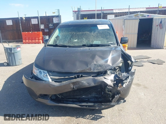 2012 Honda Odyssey EX-L with VIN 5FNRL5H61CB095789, listed as a IAAI auction lot 42065507 with 138,570 mi miles and . Bid and sale history available at DreamBid. Image 12.