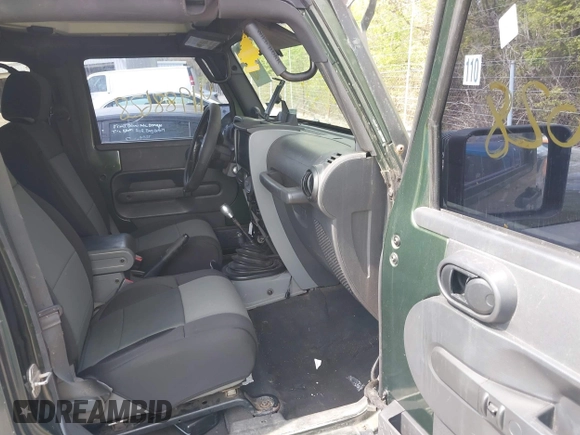 2007 Jeep Wrangler Unlimited X with VIN 1J4GA39147L101084, listed as a IAAI auction lot 41988628 with 194,562 mi miles and . Bid and sale history available at DreamBid. Image 5.