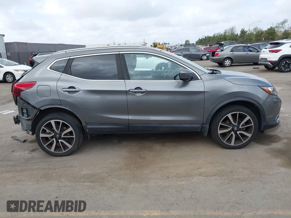2017 Nissan Rogue S with VIN JN1BJ1CP2HW017091, listed as a IAAI auction lot 41906749 with 74,591 mi miles and . Bid and sale history available at DreamBid. Image 14.