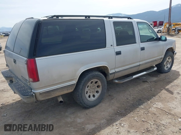 1997 Chevrolet Suburban with VIN 1GNFK16R3VJ330935, listed as a IAAI auction lot 41997594 with 231,497 mi miles and . Bid and sale history available at DreamBid. Image 4.