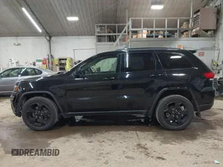 2021 Jeep Grand Cherokee Laredo X with VIN 1C4RJFAG5MC817567, listed as a IAAI auction lot 42297526 with 71,387 mi miles and . Bid and sale history available at DreamBid. Image 14.