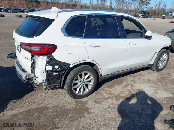 2023 BMW X5 xDrive40i with VIN 5UXCR6C02P9P67919, listed as a IAAI auction lot 41656502 with 18,787 mi miles. Bid and sale history available at carsss.com. Image 4.