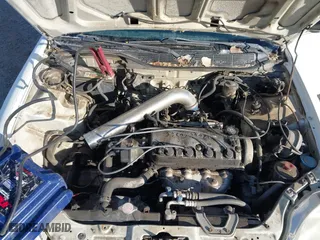 1998 Honda Civic LX with VIN 2HGEJ6675WH553663, listed as a IAAI auction lot 41062394 with 117,514 mi miles. Bid and sale history available at carsss.com. Image 10.