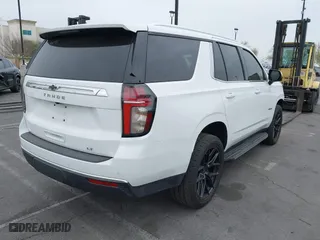 2021 Chevrolet Tahoe LT with VIN 1GNSCNKD5MR101752, listed as a IAAI auction lot 41597973 with 50,987 mi miles. Bid and sale history available at carsss.com. Image 4.