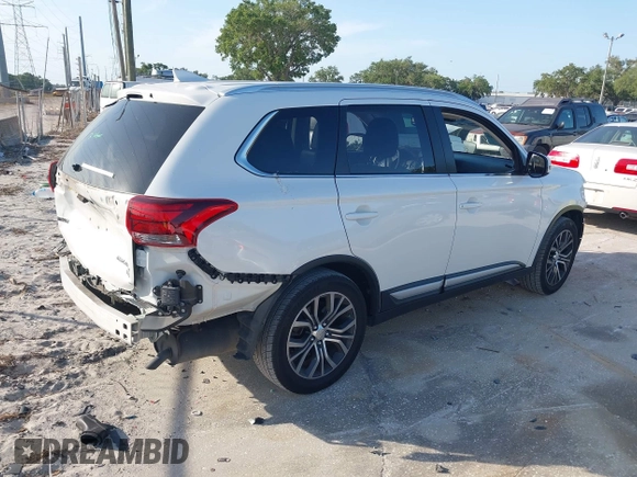 2017 Mitsubishi Outlander SE with VIN JA4AD3A36HZ032374, listed as a IAAI auction lot 42108810 with 89,034 mi miles and . Bid and sale history available at DreamBid. Image 4.