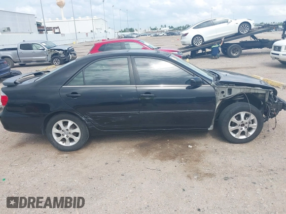 2005 Toyota Camry LE with VIN 4T1BF32K15U091945, listed as a IAAI auction lot 42124503 with 212,951 mi miles and . Bid and sale history available at DreamBid. Image 14.