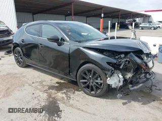2021 Mazda 3 Premium Plus z VIN JM1BPBNY2M1403797, wystawiony jako IAAI lot #42031637 z przebiegiem Nie podano mil oraz . Historia ofert i sprzedaży dostępna na DreamBid. Obrazek 1.