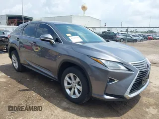 2016 Lexus RX 350 z VIN 2T2ZZMCAXGC031079, wystawiony jako IAAI lot #42120190 z przebiegiem 142 407 mil mil oraz . Historia ofert i sprzedaży dostępna na DreamBid. Obrazek 1.