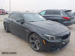 2015 BMW M4 with VIN WBS3U9C52FJ967802, listed as a IAAI auction lot 41716728 with 90,498 mi miles. Bid and sale history available at carsss.com. Image 1.