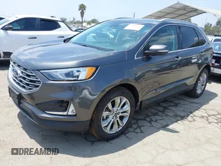 2019 Ford Edge Titanium z VIN 2FMPK3K95KBB22114, wystawiony jako IAAI lot #42432814 z przebiegiem 99 106 mil mil oraz . Historia ofert i sprzedaży dostępna na DreamBid. Obrazek 2.