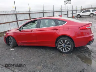 2020 Ford Fusion SE z VIN 3FA6P0T97LR234873, wystawiony jako IAAI lot #41510333 z przebiegiem 65 243 mil mil oraz . Historia ofert i sprzedaży dostępna na DreamBid. Obrazek 14.