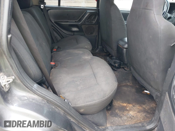 2003 Jeep Grand Cherokee Laredo with VIN 1J4GW48S83C553535, listed as a IAAI auction lot 42387097 with 360,465 mi miles and . Bid and sale history available at DreamBid. Image 8.