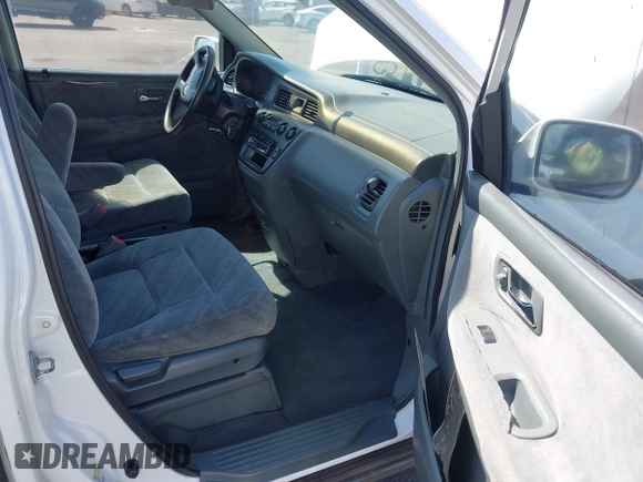 2002 Honda Odyssey EX z VIN 2HKRL18632H556791, wystawiony jako IAAI lot #41562553 z przebiegiem 222 976 mil mil oraz . Historia ofert i sprzedaży dostępna na DreamBid. Obrazek 5.