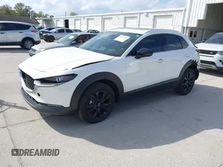 2022 Mazda CX-30 2.5 Turbo Premium Package with VIN 3MVDMBDY3NM437897, listed as a IAAI auction lot 41715776 with 42,771 mi miles. Bid and sale history available at carsss.com. Image 2.