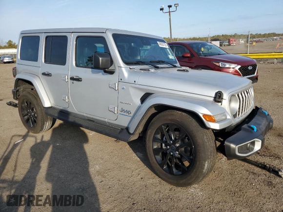 2024 Jeep Wrangler Sahara with VIN 1C4RJXP60RW128448, listed as a Copart auction lot 48658135 with 5,879 mi miles and Salvage Title. Bid and sale history available at DreamBid. Image 4.