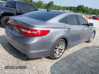 2015 Hyundai Azera Limited z VIN KMHFH4JG2FA483575, wystawiony jako IAAI lot #42422877 z przebiegiem 111 147 mil mil oraz . Historia ofert i sprzedaży dostępna na DreamBid. Obrazek 4.