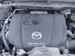 2016 Mazda CX-5 Grand Touring z VIN JM3KE4DY9G0605489, wystawiony jako IAAI lot #42085160 z przebiegiem 160 338 mil mil oraz . Historia ofert i sprzedaży dostępna na DreamBid. Obrazek 10.