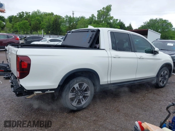 2019 Honda Ridgeline RTL-T z VIN 5FPYK2F69KB004726, wystawiony jako IAAI lot #42189854 z przebiegiem 71 665 mil mil oraz . Historia ofert i sprzedaży dostępna na DreamBid. Obrazek 14.