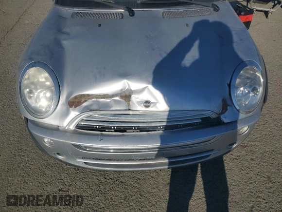 2005 MINI Convertible with VIN WMWRF33465TG10044, listed as a Copart auction lot 50364235 with 152,186 mi miles and Salvage title. Bid and sale history available at DreamBid. Image 11.