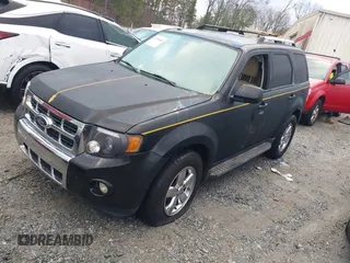 2010 Ford Escape Limited z VIN 1FMCU0EG0AKC63470, wystawiony jako IAAI lot #41198945 z przebiegiem 198 301 mil mil oraz . Historia ofert i sprzedaży dostępna na DreamBid. Obrazek 17.