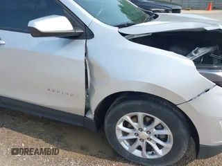 2019 Chevrolet Equinox LT z VIN 3GNAXKEV9KS504114, wystawiony jako IAAI lot #42353280 z przebiegiem 67 573 mil mil oraz . Historia ofert i sprzedaży dostępna na DreamBid. Obrazek 17.