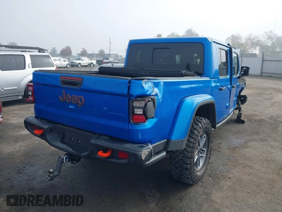 2024 Jeep Gladiator Mojave X z VIN 1C6JJTEG5RL121313, wystawiony jako IAAI lot #41013599 z przebiegiem 2 952 mil mil oraz . Historia ofert i sprzedaży dostępna na DreamBid. Obrazek 4.