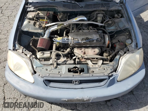 1997 Honda Civic EX z VIN 1HGEJ814XVL050754, wystawiony jako Copart lot #47322705 z przebiegiem 190 960 mil mil oraz Szkoda całkowita • Salvage title. Historia ofert i sprzedaży dostępna na DreamBid. Obrazek 11.