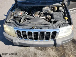 1999 Jeep Grand Cherokee Laredo with VIN 1J4GW58SXXC786179, listed as a Copart auction lot 79774564 with 272,192 mi miles and Salvage Title. Bid and sale history available at carsss.com. Image 13.
