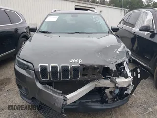 2019 Jeep Cherokee Latitude Plus with VIN 1C4PJMLB2KD113945, listed as a IAAI auction lot 41477510 with 38,143 mi miles and . Bid and sale history available at DreamBid. Image 12.