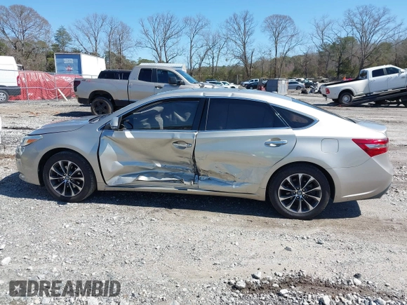 2018 Toyota Avalon XLE with VIN 4T1BK1EB9JU283488, listed as a IAAI auction lot 41777239 with 97,893 mi miles and . Bid and sale history available at DreamBid. Image 14.