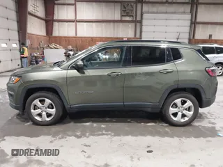 2021 Jeep Compass Latitude with VIN 3C4NJDBB1MT566220, listed as a IAAI auction lot 41816107 with 69,139 mi miles and . Bid and sale history available at DreamBid. Image 14.