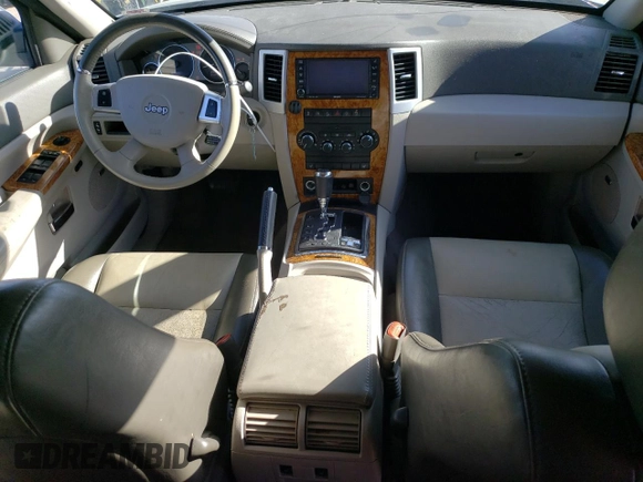 2010 Jeep Grand Cherokee Limited with VIN 1J4RR5GT3AC135686, listed as a Copart auction lot 52961465 with 136,034 mi miles and Salvage title. Bid and sale history available at DreamBid. Image 8.