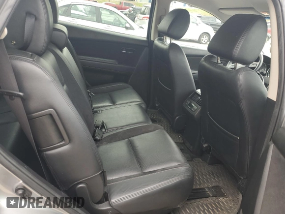 2014 Mazda CX-9 Touring с VIN JM3TB2CA2E0431879, выставлен на аукционе Copart как лот 64778845 с пробегом 145 476 миль миль и Чистый • Clean title. История ставок и продаж доступна на DreamBid. Изображение 11.