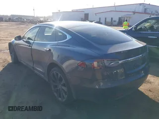 2019 Tesla Model S 75D with VIN 5YJSA1E2XKF331744, listed as a IAAI auction lot 41483173 with Not provided miles and . Bid and sale history available at DreamBid. Image 3.
