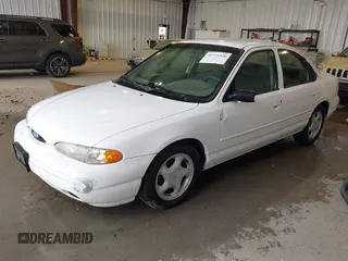 1997 Ford Contour LX with VIN 1FALP6537VK132379, listed as a IAAI auction lot 42771426 with 122,263 mi miles and . Bid and sale history available at DreamBid. Image 2.
