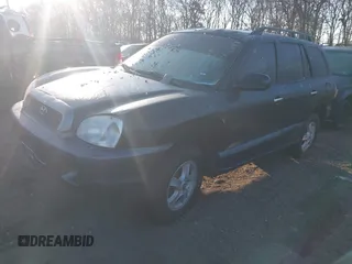 2004 Hyundai Santa Fe GLS with VIN KM8SC73E04U611897, listed as a IAAI auction lot 41648490 with Not provided miles and . Bid and sale history available at DreamBid. Image 2.