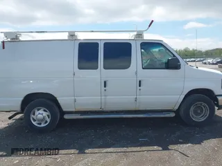 2014 Ford Econoline Cargo Commercial z VIN 1FTNE2EW8EDA43498, wystawiony jako IAAI lot #42222092 z przebiegiem 145 528 mil mil oraz . Historia ofert i sprzedaży dostępna na DreamBid. Obrazek 13.