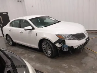 2014 Lincoln MKS with VIN 1LNHL9EK5EG605750, listed as a IAAI auction lot 41565308 with 167,835 mi miles. Bid and sale history available at carsss.com. Image 1.