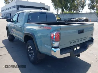 2023 Toyota Tacoma SR with VIN 3TMCZ5AN3PM590101, listed as a IAAI auction lot 42338670 with 12,970 mi miles and . Bid and sale history available at DreamBid. Image 3.