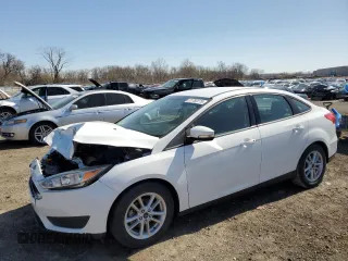 2017 Ford Focus SE with VIN 1FADP3F27HL320293, listed as a Copart auction lot 51782275 with 24,789 mi miles and Salvage title. Bid and sale history available at DreamBid. Image 1.